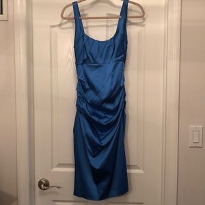 Stun the room in this shiny blue dress!